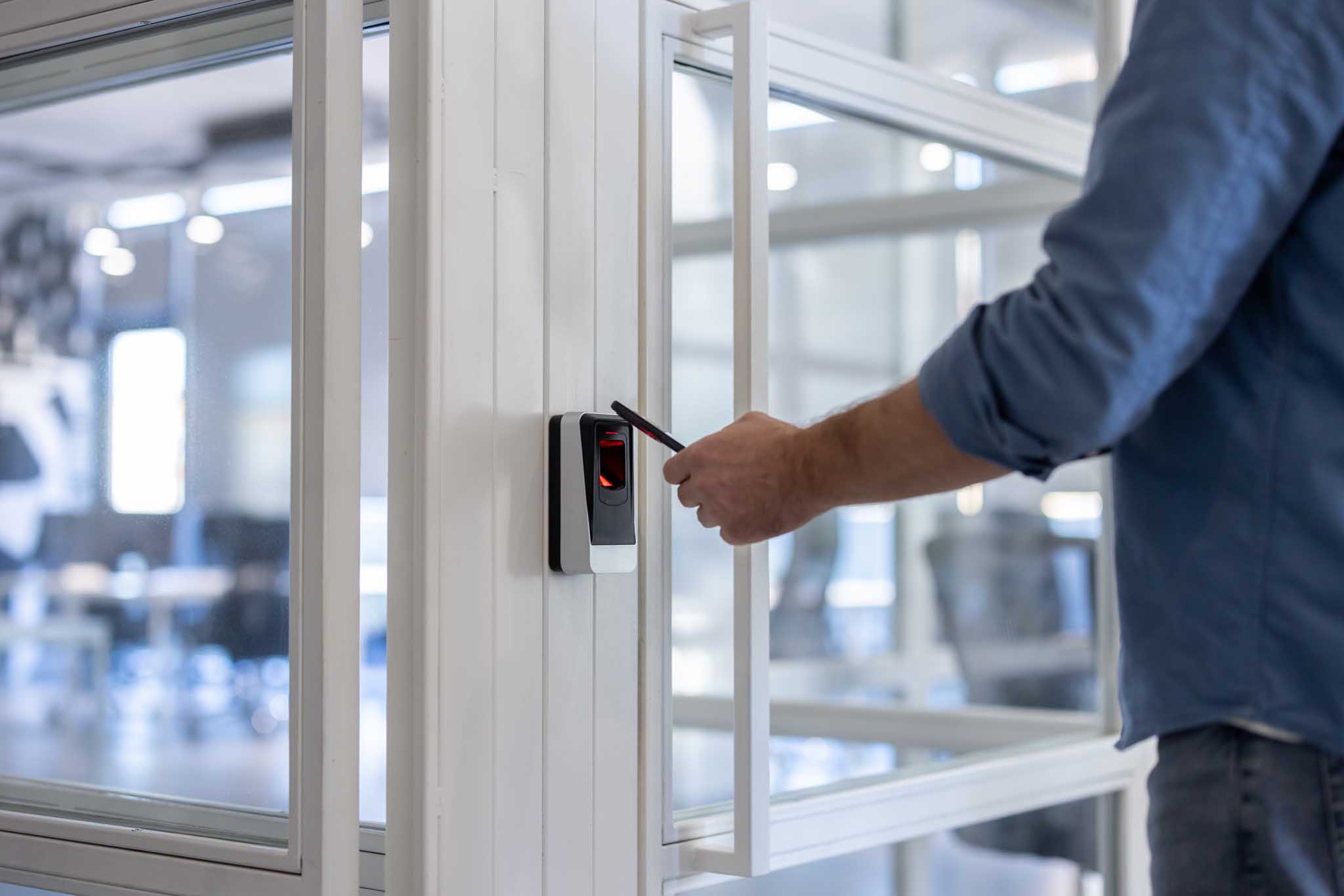 Person using security card for access control system